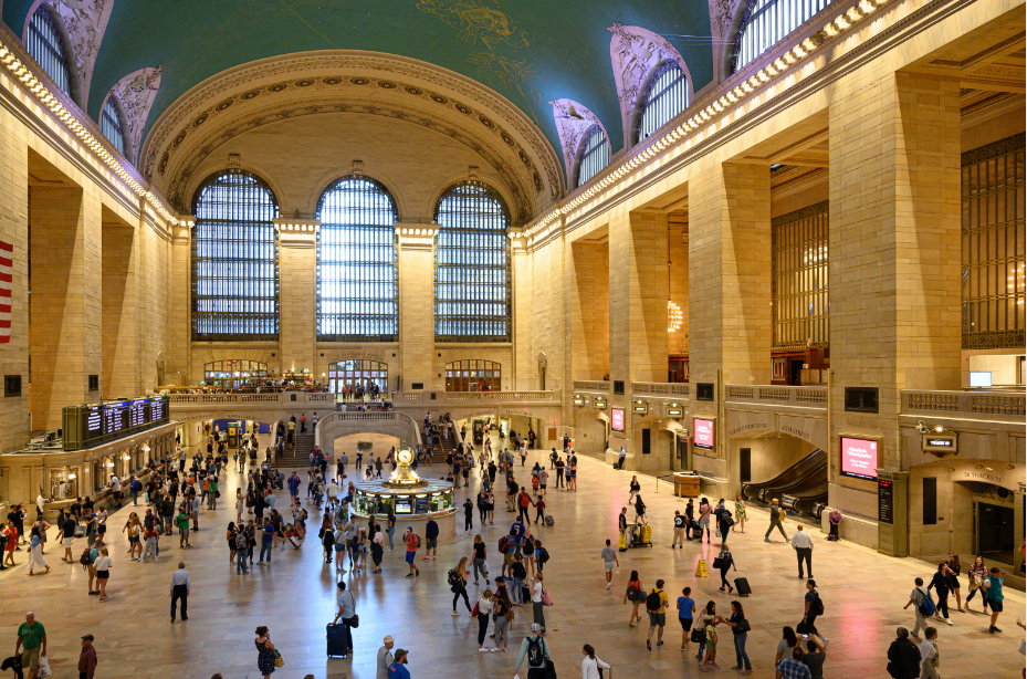 people in new york city walking inside the grand central station nyc